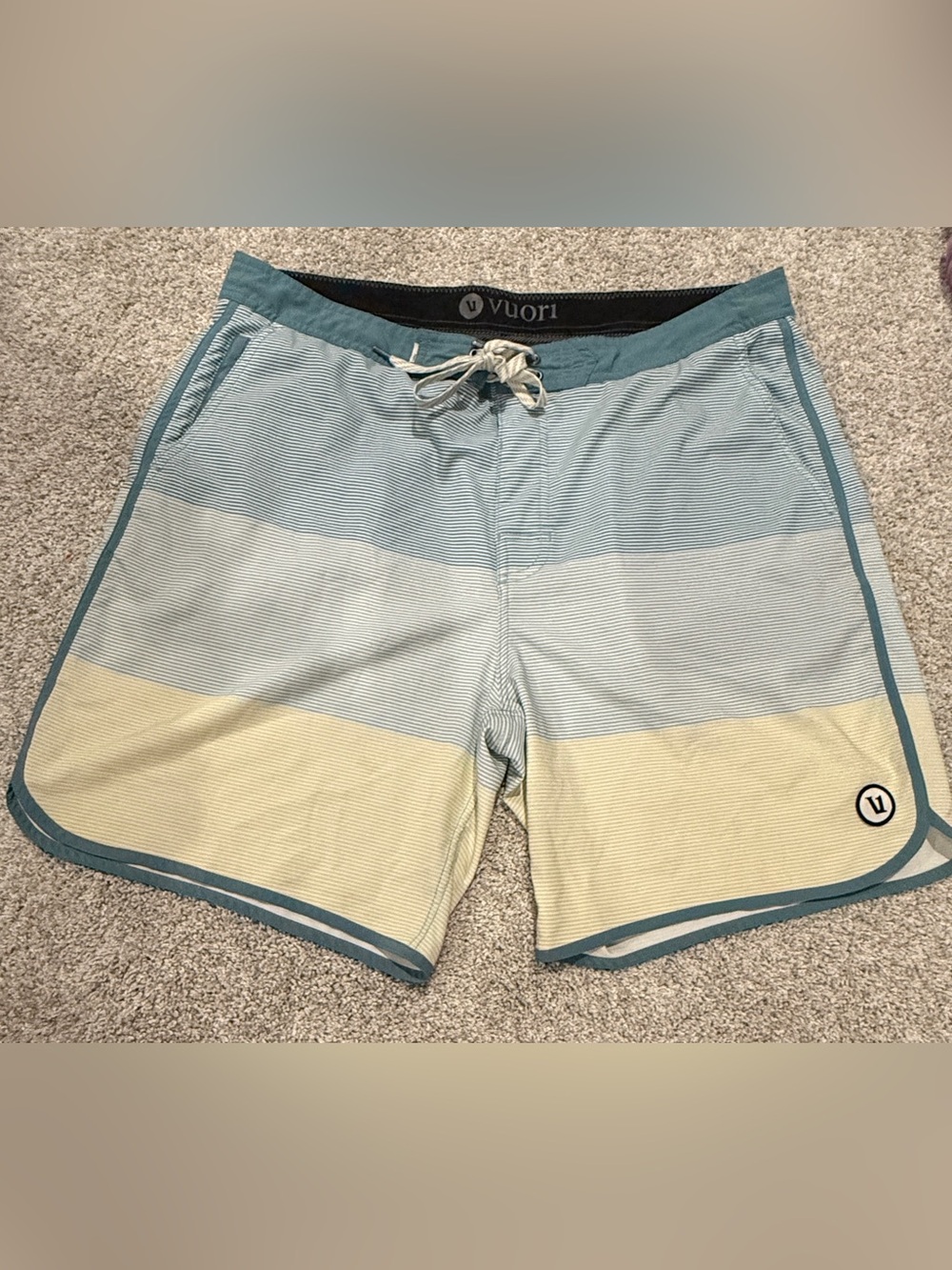 Vuori Men's Striped Board Shorts size 36. Inseam 8 inches.